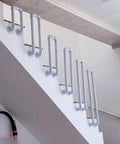 Tough As Nails Industrial Pipe Railing Featuring Slick Non Slip Iron Guardrail for indoor stairs with white iron tubes.