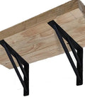 Two Pack Rock Solid Shelf Brackets 16 By 12 Inch Wall Mounted Heavy Duty Floating Support Braces Matte Black Steel Braces holding wood shelf.