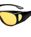 Pro-Level Safety Glasses With Side Shields Scratch And Fog Resistant Clear Lenses designed for cyclists, featuring a black frame and yellow lenses.