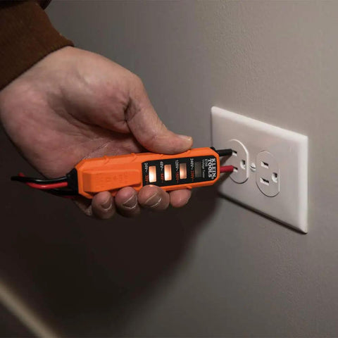 Person using Digital Multimeter Electrical Test Kit With Non Contact Voltage Tester And Receptacle Tester For Diyers 600V AC DC 10A DC 2 Ohm