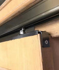 Heavy Duty Two Door Sliding Barn Door Hardware Kit With Flex Bronze Aluminum Track and Smooth Rolling Wheels installation detail.