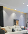 Smooth 10W Dimmable Cob Led Spotlight 12 Pack, Tough Anti Glare Recessed Downlight For House Or Commercial Space, Cri90 Plus Natural White ceiling lights over a modern living room sofa.
