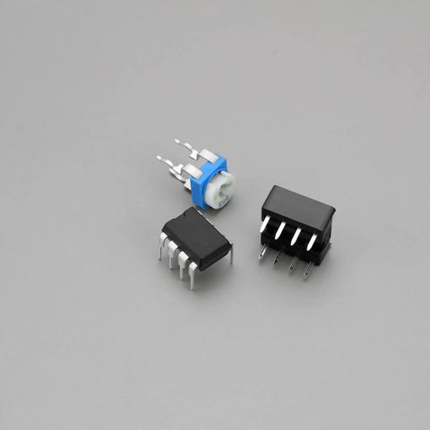 Components of Two Piece Heart Shaped LED Soldering Practice Kit With Flashing Lights For DIY Electronics Projects in red.