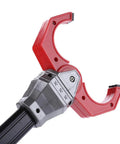 Close-up of Retro Robot Arm Grabber Toy for Kids with Pull and Release Grip and Rad Clacking Sound Plastic Robotic Pinch Tool