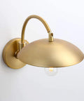 Dope Industrial Swing Arm Wall Sconce In Brass Finish Adjustable Hardwired Wall Lamp With Metal Base Retro Indoor Lighting Fixture For Hallway Bedroom Living Room Dining Area And Cafe Decor, showing a brass UFO-shaped shade with exposed bulb.