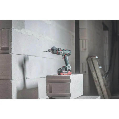 Professional Heavy Hitter 18V Brushless Cordless Hammer Drill Driver Set Includes Two 52Ah Lithium Ion Batteries Quick Charger on block.
