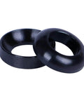 Close-up of Titanium M6 Washer Set Black TC4 Grade 5 Concave and Convex Washers, 12mm OD, 7mm ID, 3mm thick, 4 pack for M6 bolts.