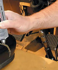 Person applying Hi Visc 3.7-Ounce Adhesive Go-To Bond For Tough Projects 2x Stronger And 60x More Flexible Than Polyurethane on equipment.