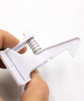 Close-up of 16 Pack Kidproof Cabinet Locks For Cabinets Dressers And Refrigerators Easy Install ABS Safety Locks To Keep Babies