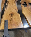 Live Edge Black Walnut Barn Door Handcrafted In Minnesota Made To Order One Of A Kind Custom Wood Sliding Door For Modern Rustic Homes Hand Finished With Rich Grain And Natural Edge Details, showcasing rich wood grain and metal handle detail