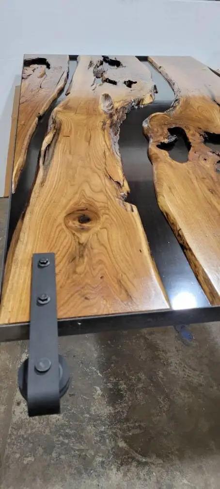 Live Edge Black Walnut Barn Door Handcrafted In Minnesota Made To Order One Of A Kind Custom Wood Sliding Door For Modern Rustic Homes Hand Finished With Rich Grain And Natural Edge Details, showcasing rich wood grain and metal handle detail