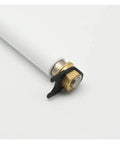 Close-up of Top Tier Platen Roller for Thermal Label Printers with brass and black plastic components.