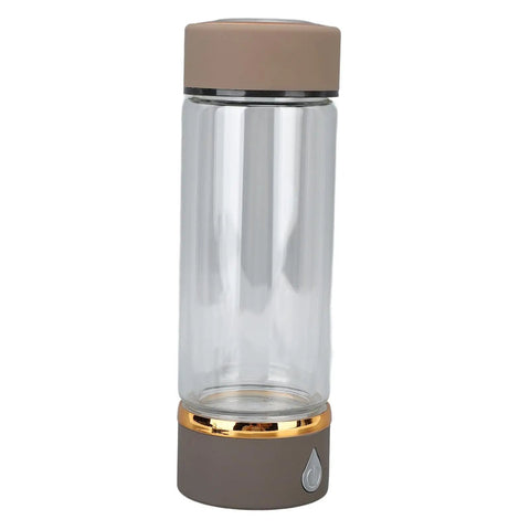 Keep It Fresh And Locked In With This Portable Hydrogen Water Bottle Featuring USB Rechargeable Tech And Stainless Steel Build For Antioxidant Rich Hydration At The Gym Or Office All Day Long - clear glass body and brown lid.