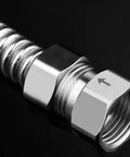 Close-up of stainless steel 1/2 in female to 1/2 in male check valve with flow arrow