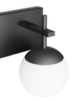 Close-up of Matte Black Two Light Bathroom Wall Light Fixtures With Milky Glass Globes, sleek mid-century modern design.