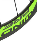 Close-up of R13 hub decal on carbon fiber road wheelset clincher 50mm depth with basalt braking surface and V brake ready rims.