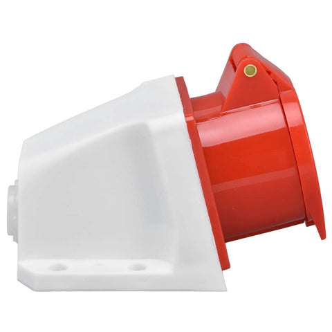 Tough As Nails Industrial Cee Socket Wall Mounted Heavy Duty Polycarbonate Housing With Genuine Brass Contacts Ip44 Weather Proof Plug And Play Power Receptacle Dead Nuts Reliable For Campsites Worksites And Job Sites side view of red and white wall-mounted power receptacle