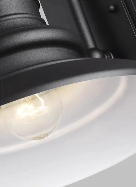 Close-up of the 12-inch Redding Station Outdoor Wall Light in Aluminum for Wet Locations, black textured finish, restoration style.