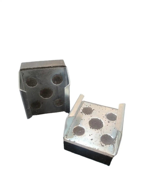 Close-up of wear-resistant friction pads for Vertical And Horizontal Pneumatic Disc Brake Chuck Slitting Machine with high durability.