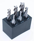 Front view of six end mills in a black plastic stand; 3/8 in shank; sizes 1/8–1/2 in.