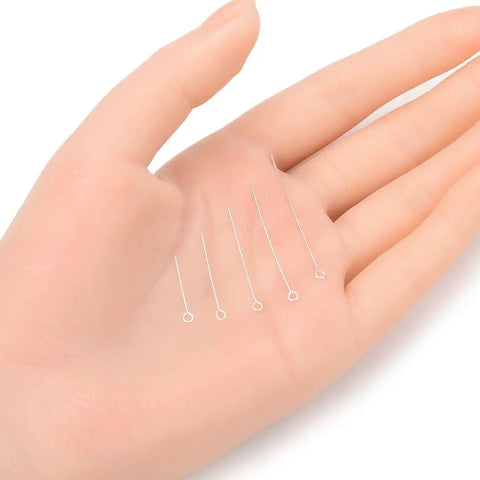 Real Sterling Silver Eye Pins, 50mm 2 Inch, 24 Gauge 0.5mm, 20 Pack For Jewelry Making, Hypoallergenic Nickel Free Lead Free Craft Wire Pins, Durable And Bendable shown in hand