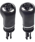 Sleek Black And Silver Manual Gear Shift Knob For Opel Cars Perfect Upgrade For 5 Or 6 Speed Manuals Simple DIY Install No Tools Needed To Spice Up Your Ride Today. Black plastic and metal manual gear shift knob for Opel 6-speed, front view on white background