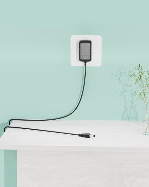 Hella Reliable And Top Shelf 6 Volt Ac Adapter And Power Supply Charger For Skil And Bosch Cordless Drills With Smart Overload Protection Knockout Home Workshop Charging plugged into a wall.