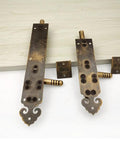 Heavy Duty Solid As A Rock Pure Copper Barrel Bolt Sliding Door Latch With Padlock, two sizes, decorative design, mounted on wood.