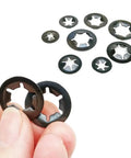 65Mn Steel External Circlips Kit With Self Locking Retaining Clips For Shafts And Snap Ring Washers Push On Sizes From M2.5 To M10 350 Pieces Per Box Assortment, black circlips shown in hand