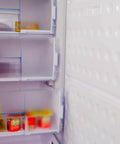 Interior view of Straight Up Spacious 11 Cubic Foot Upright Freezer With Built In Drawer Organizer, showing adjustable shelves.