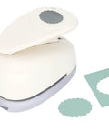 2.5 Inch Scalloped Ellipse Lever Action Craft Punch for Paper Crafting and Scrapbooking shown with cutout shapes
