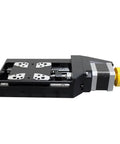 Rock Solid Precision Motorized Linear Translation Stage Featuring Electric Displacement Slide And Heavy Duty Stepper Actuator, side view of black aluminum stage.