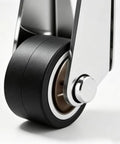 Heavy Duty Vertical Track Roller Wheels 8 Piece Set Anti Sag Sliding Door Bottom Guides close-up of black rubber wheel with metal axle.