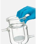 Heavy Duty Three Port Double Jacketed Open Reactor With G2 Sand Filter And PTFE Diverter Valve for High Speed Solid Liquid Separation, close-up showing hand adjusting lid.