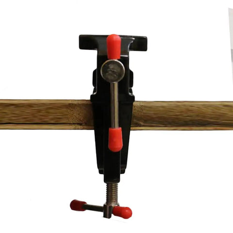 Compact Mini Vise Clamp With A Rock Solid Hold For Woodworking Carving And Jewelry Diy Tasks Dead Simple Table Clip Mount Black Finish mounted on wood.
