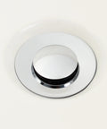 Heavy Duty Bathroom Sink Drain Stopper Assembly With Lift Rod And Overflow In Chrome Finish Fits Standard One And A Half Inch Or One And Three Quarter Inch Drains For Easy Install And No Fuss Water Flow visible in a sink.