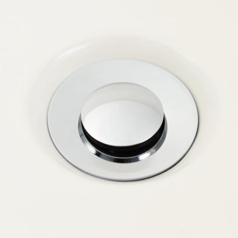Heavy Duty Bathroom Sink Drain Stopper Assembly With Lift Rod And Overflow In Chrome Finish Fits Standard One And A Half Inch Or One And Three Quarter Inch Drains For Easy Install And No Fuss Water Flow visible in a sink.