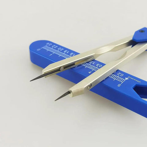 Premium Stainless Steel ECG Calipers For Precise Wave Measuring And Accurate EKG Readouts Durable Anti Rust Arms With Smooth Adjustable Hinge Easy To Open And Close Fits Various Waveform Intervals Pro Grade Build Ideal Instrument For Clinicians. blue stainless steel ECG calipers with ruler scale
