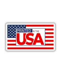 Printed in the USA sticker with American flag background.