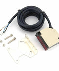 E3JK-DS30M2 Specular Diffuse Reflection Sensor with cable, mounting bracket, and screws for industrial automation