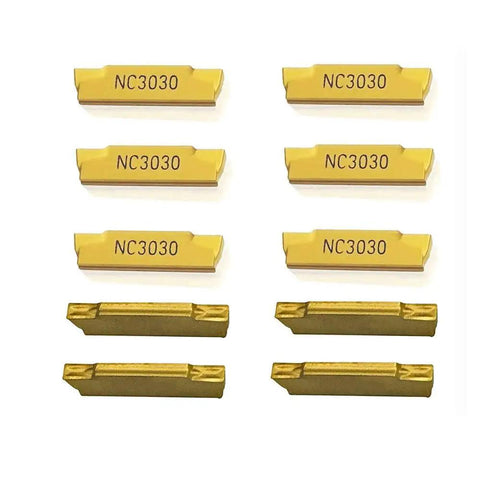 Set of ten NC3030 carbide inserts aligned in rows, compatible with Heavy Duty Lathe Grooving Tool Holder Set for steel applications.