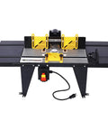 Heavy Duty Aluminum Benchtop Router Table With Reinforced Steel Extensions And Adjustable Miter Gauge Plus Built In Retractable Safety Guard For Rock Solid Cutting Performance In Bright Orange, front view with clamps and control switch.