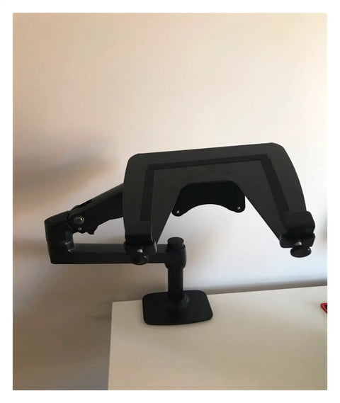Heavy Duty Aluminum Spring Arm Desk Mount Supports 17 To 27 Inch Screens With A Dang Sturdy Clamp, shown from side angle.