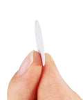 Person holding a white PVC screw hole cover, part of the Fifty Four Pack 21 Mm Self Adhesive Screw Hole Covers White Pvc Dustproof Caps For Wood Furniture Cabinet And Wardrobe Quick Slap On Fix For A Dope Game Changing Home Decor Touch.