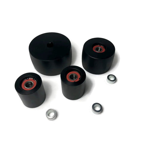 Killer Delrin Wheel Set Slaps Onto Your 2X72 Belt Grinder With A Rock Solid 4 Inch Drive And Five Eighths Inch Bore showing wheels.