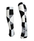High Performance Unisex Athletic Compression Socks Featuring Graded Ankle Support Breathable Moisture Wicking Fabric Black White Piano Plate Grid Design, side view.