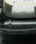 Close-up of 12x2 Inch Electric Trailer Brake Magnet Kit For 5200 To 7000 Lbs Dexter Type Replacement with coil spring detail.