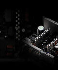 Close-up of Beefy 450 Watt Computer Power Supply with components showcasing 80 Plus Bronze efficiency and cooling features.