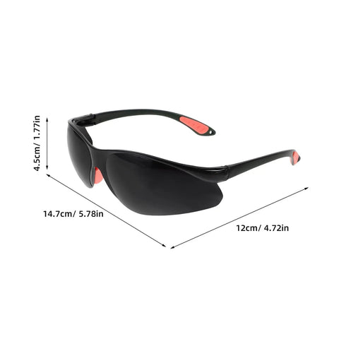 Top Shelf Welding Goggles 4 Pack With Splash Resistant Lens And Impact Rated Frame, black safety goggles with red grips.