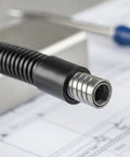 Heavy Duty Flexible Conduit With PVC Coated Galvanized Steel Core Gray Thickened 64mm 10m end view on blueprints.